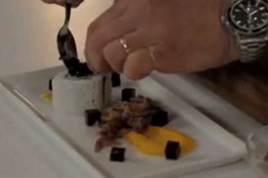 Simon Rimmer and his ringed fingers lovingly applying the "pièce de résistance": The caviar. Or should we say, catviar?